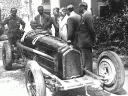 [thumbnail of 1932 alfa romeo p3 - benito mussolini sits in cockpit with tazio nuvolari watching.jpg]